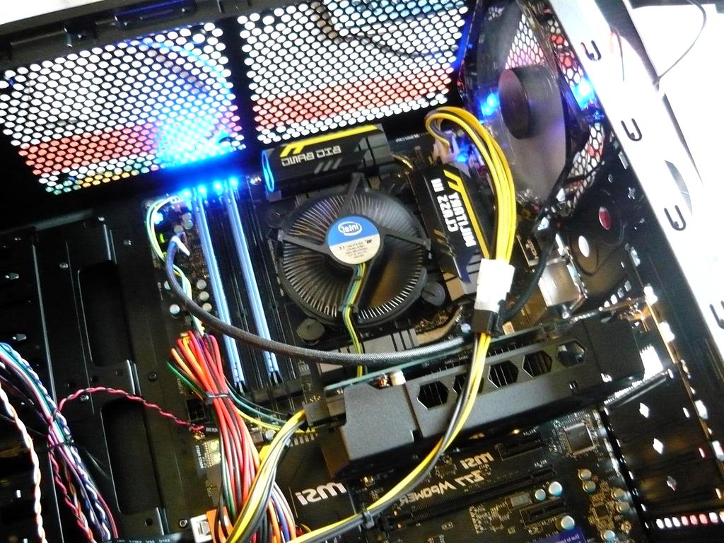 Close-up of compatible computer components connected on a motherboard